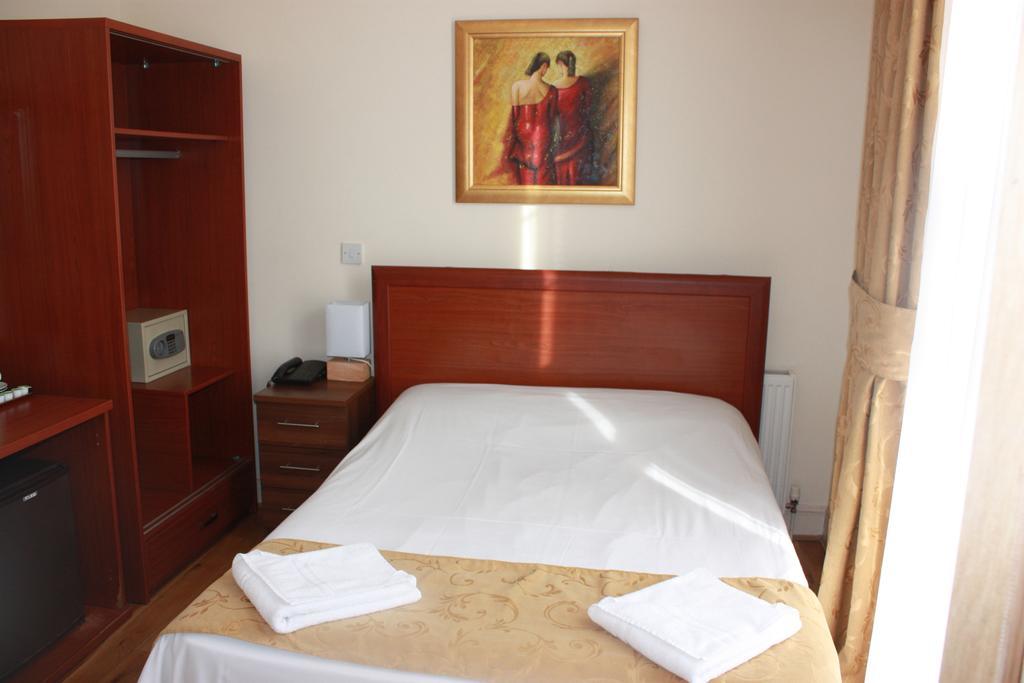 Corner House Hotel Лондон Номер фото